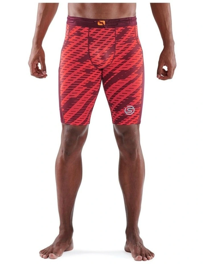 SKINS Series 3 Compression Half Tights Activewear In Orange 1 SKINS Series 3 Compression Half Tights Activewear In Orange