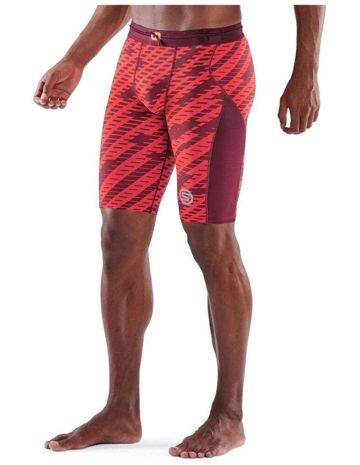SKINS Series 3 Compression Half Tights Activewear In Orange 2 SKINS Series 3 Compression Half Tights Activewear In Orange - Image 2